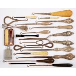 SIX SILVER HANDLED GLOVE STRETCHERS AND A PAIR OF SILVER HANDLED CURLING TONGS, VARIOUS DATES,