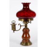 A BRASS MOUNTED AND TURNED WOOD LAMP, IN THE FORM OF A 19TH C OIL LAMP WITH REEDED GLASS SHADE, 51CM