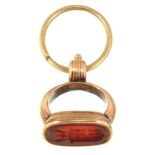 A CORNELIAN INTAGLIO FOB SEAL IN GOLD, UNMARKED, 9.95G++SLIGHT BUILD UP OF DIRT AND GRIME;