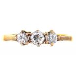 A THREE STONE DIAMOND RING IN GOLD, UNMARKED, 1.7G, SIZE N++GOOD CONDITION