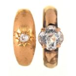 A GYPSY SET DIAMOND RING IN GOLD, UNMARKED, 2.6G, AND A GEM SET RING IN GOLD, MARKED 10CT, 2.1G,