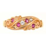 A GYPSY SET RUBY AND DIAMOND RING IN GOLD, MARKED 18CT, 2.1G, SIZE M++GOOD CONDITION