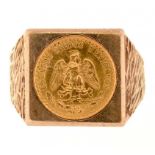 GOLD COIN. A 9CT GOLD RING SET WITH A MEXICAN FIFTY PESOS, LONDON 1974, 10.3G, SIZE S++GOOD