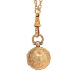 A GOLD MOURNING LOCKET INSET WITH HAIR, UNMARKED, ON A GOLD NECKLACE, UNMARKED, 72CM, 13,9G++GOOD