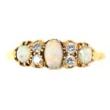 AN OPAL AND DIAMOND RING IN GOLD, MARKED 18CT, MAKER'S MARK RE&S, 3.4G, SIZE P++GOOD CONDITION