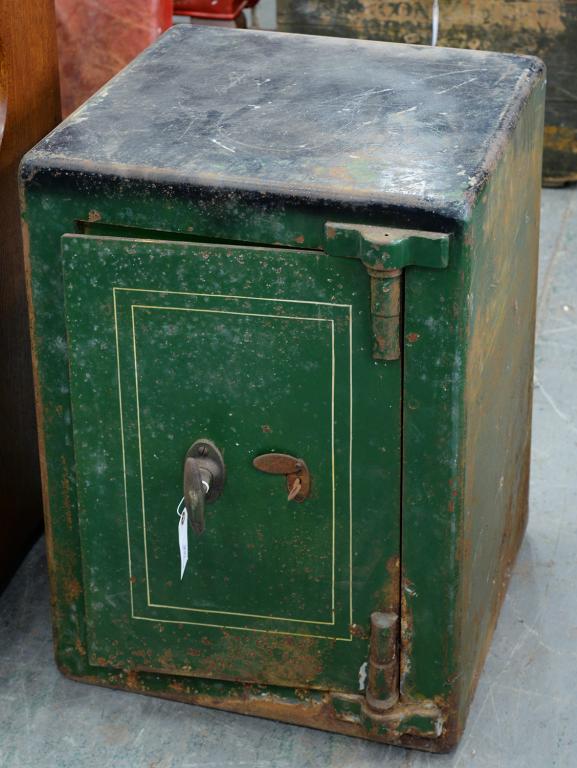 A GREEN PAINTED IRON SAFE WITH KEY, 66CM H; 49 X 45CM