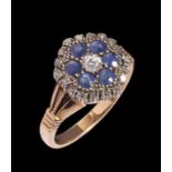 A SAPPHIRE AND DIAMOND CLUSTER RING in gold, marked 18ct, 4.2g, size N++Good condition