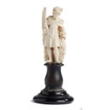 AN AUSTRO HUNGARIAN IVORY STATUETTE OF ST FLORIAN, LATE 19TH C on ebonised base, 18cm hProvenance: