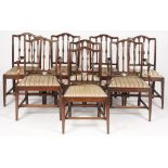 A SET OF EIGHT MAHOGANY DINING CHAIRS, EARLY 20TH C with carved stick splats, the set including a