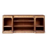 A WILLIAM IV GONCALO ALVES BREAKFRONT BOOKCASE, C1830-40 with panelled sides, 91cm h; 49 x 221cm ++