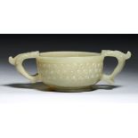 A CHINESE ARCHAIC STYLE JADE CUP, 19TH/EARLY 20TH C 12cm over handlesProvenance: Malcolm Sinclair (