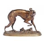 A FRENCH BRONZE SCULPTURE OF A GREYHOUND, EARLY 20TH C cast from a model by Gustave Trouillard,