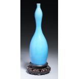 A CHINESE KINGFISHER BLUE GLAZED DOUBLE GOURD VASE, 20TH C 26.5cm h, wood stand (2)++Good condition