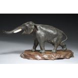 A JAPANESE BRONZE SCULPTURE OF AN ELEPHANT, MEIJI PERIOD 13.5cm h, Seiya saku mark, wood base (2)++