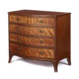 A VICTORIAN SERPENTINE SATINWOOD, MAHOGANY AND ROSEWOOD COMMODE, C1880 the top with figured mahogany