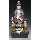 A KUTANI GROUP OF KANNON AND CHILD, MEIJI PERIOD 29cm h++Insignificant firing crack on dragon at the