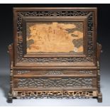 A CHINESE PIERCED ROSEWOOD TABLE SCREEN AND STAND, 19TH/EARLY 20TH C the screen with traces of