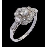 AN ART DECO DIAMOND CLUSTER RING the central diamond weighing approx 0.9ct, in platinum, marked