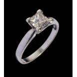 A DIAMOND SOLITAIRE RING the princess cut diamond weighing approx 1ct, in 18ct white gold, maker's