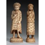 TWO INDIAN MUGHAL STYLE CARVED IVORY STATUETTES, LATE 19TH C 20.5 and 21cm h ++The back of each