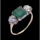 AN EMERALD AND DIAMOND THREE STONE RING the cushion cut emerald 8 x 8mm between round brilliant