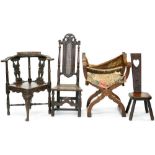 A GEORGE III OAK CORNER CHAIR, LATER CARVED, AN ITALIAN STYLE WALNUT X-FRAMED CHAIR AND TWO OTHERS