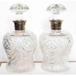 A PAIR OF SILVER MOUNTED CUT GLASS DECANTERS AND STOPPERS, 22CM H, LONDON, 1935 ++Both in good