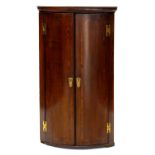 A VICTORIAN INLAID MAHOGANY BOW FRONTED CORNER CUPBOARD, 110 X 62CM