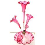 A VICTORIAN CRANBERRY GLASS FLOWER STAND WITH SHELL PINCERED, SPIRAL APPLIED DECORATION, 50CM H ++