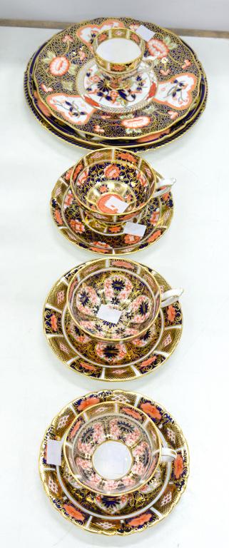 THREE ROYAL CROWN DERBY IMARI PATTERN CUPS AND SAUCERS AND AN UNUSUAL ROYAL CROWN DERBY JAPAN