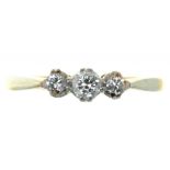 A THREE STONE DIAMOND RING IN GOLD, WEIGHING APPROX 0.15CT IN TOTAL, MARKED 18CT PLAT, 2.35G, SIZE K