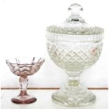 A CUT GLASS SWEETMEAT JAR AND COVER OF SHIELD SHAPE, 17.5CM H, C1900 AND A GLASS SHELL SHAPED