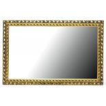 A GILTWOOD AND COMPOSITION FRAMED MIRROR WITH BEVELLED PLATE, IN VICTORIAN STYLE, 122 X 80CM