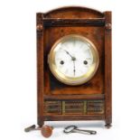 A LATE 19TH C STAINED WOOD MANTEL CLOCK WITH ARCHED PEDIMENT, 35CM H ++Poor condition with damaged