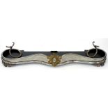 A LATE VICTORIAN BURNISHED STEEL SERPENTINE FENDER, 136CM W