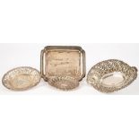 FOUR VARIOUS DECORATIVE SILVER DISHES AND A MINIATURE OBLONG TRAY, THE LAST ENGRAVED THE