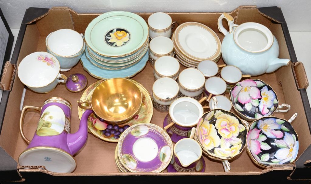 A NORITAKE MAUVE GROUND COFFEE SET, PAINTED WITH OVAL LANDSCAPE PANELS, A SET OF FIVE WEDGWOOD