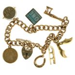 A 9CT GOLD CHARM BRACELET, 17.6G ++GOOD CONDITION