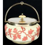 A VICTORIAN EPNS MOUNTED PRIMROSE SATIN GLASS BISCUIT BARREL AND COVER, CASED IN PINK GLASS AND