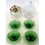 A CUT GLASS SUGAR BOWL, COVER AND STAND OF SHIELD SHAPE, 21CM H, AN EPNS MOUNTED, FACETED GLASS