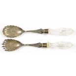 A PAIR OF EDWARD VII CUT GLASS HAFTED SILVER SHELL SHAPED SALAD SERVERS, LONDON 1902