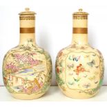 A PAIR OF JAPANESE SATSUMA EARTHENWARE MALLET SHAPED VASES AND COVERS, ENAMELLED WITH PANELS OF