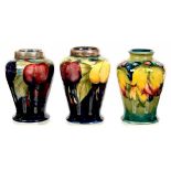 TWO MOORCROFT EPNS MOUNTED MINIATURE WISTERIA VASES DESIGNED BY WILLIAM MOORCROFT, C1925, 9CM H