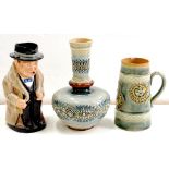 A ROYAL DOULTON WINSTON CHURCHILL TOBY JUG, 22CM H, PRINTED MARK AND A DOULTON WARE VASE AND SIMILAR