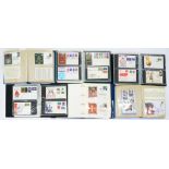 A COLLECTION OF GB AND CHANNEL ISLANDS FIRST DAY COVERS, ALL ERII, IN SIX MODERN BINDERS