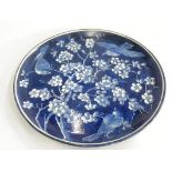 MARY BUTTERTON. A DOULTON LAMBETH FAIENCE 'KANGXI' BLUE AND WHITE PLAQUE, 1874-1893 PAINTED WITH