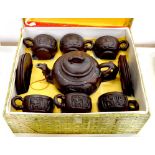 A CHINESE YIXING STONEWARE TEASET, TEAPOT AND COVER 12CM H, WOVEN SILK COVERED BOX 20TH C