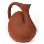 DOCTOR CHRISTOPHER DRESSER. A LINTHORPE TERRACOTTA 'CAMEL BACKED' JUG, C1880, 16CM H, IMPRESSED