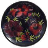A MOORCROFT ANEMONE WALL PLATE, DESIGNED BY WALTER MOORCROFT, LATE 20TH C, 26CM DIAM, IMPRESSED