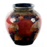 A MOORCROFT POMEGRANATE VASE, DESIGNED BY WILLIAM MOORCROFT, C1925, 8.5CM H++Good condition, no